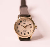 Pequeña Timex Indiglo reloj para mujeres en una correa de cuero marrón