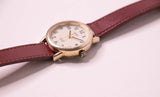Antiguo Timex Indiglo reloj para mujeres en una correa de cuero rojo