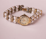 Orologio eko quarzo vintage oro con un unico braccialetto di orologio perla