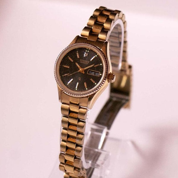Antiguo Citizen Día y fecha reloj Citizen Quartz 6000-914376 KT