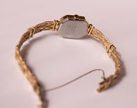 Vintage de tono de oro Seiko 1400-8289R cuarzo reloj para mujeres