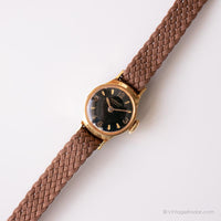 Ancien Junghans montre pour les femmes avec un cadran noir - Montre-bracelets allemands