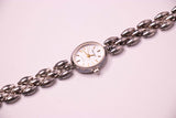Pequeño tono plateado vintage Armitron reloj para mujeres 1990s