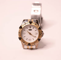 Vintage bicolore Guess montre pour les femmes avec un bracelet en acier inoxydable