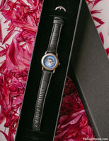Fase lunar de gloria desteñida vintage reloj para mujeres con dial azul