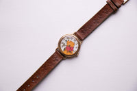 Ancien Timex Winnie the Pooh montre avec la fonction des abeilles rotatives