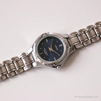 Tono plateado vintage Lorus reloj para ella | Mechón de pulsera de damas azules de dial