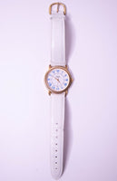 Klassiker Vintage Guess Uhr mit blauen römischen Ziffern und weißem Riemen