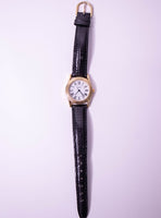 Klassiker Vintage Guess Uhr mit schwarzem Lederband und römischen Ziffern