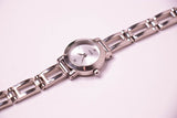 Minuscule Guess Femmes en argent montre avec bracelet en acier inoxydable vintage