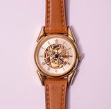Tone d'or vintage Fossil Quartz montre pour les femmes avec un cadran squelettique