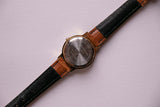 Rare phase de lune milienne vintage montre avec bracelet en cuir marron
