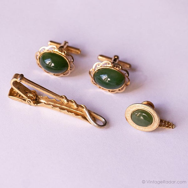 Pinocchi di gemelli oro vintage con pietre verdi, cravatta e pernotta