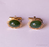 Pinocchi di gemelli oro vintage con pietre verdi, cravatta e pernotta