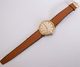 Goldfarbener mechanischer Timex Uhr für Männer | 60er Jahre Vintage Timex Armbanduhr