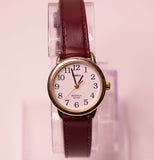 Timex Indiglo WR 30m Uhr mit einem weißen Zifferblatt und Licht