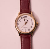 Timex Indiglo WR 30m reloj con una esfera blanca y luz