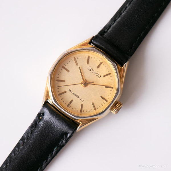 Vintage Oppida mecánico reloj | Tono dorado reloj con correa negra
