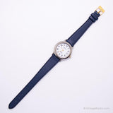 Chariot à ton argenté vintage par Timex montre Pour les dames avec une sangle bleu marine