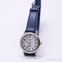 Carruaje de tonos plateados vintage por Timex reloj para mujeres con correa azul marino