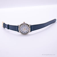 Chariot à ton argenté vintage par Timex montre Pour les dames avec une sangle bleu marine