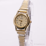 Transporte de tonos de oro vintage por Timex reloj para damas | Wallwatch clásico