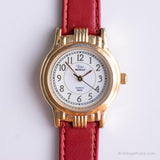 Tono d'oro vintage Timex Orologio indiglo per donne con cinturino in pelle rossa