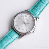Vintage de 35 mm en argent Timex Quartz montre avec sangle en cuir bleu