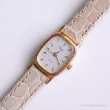 Rectangulaire vintage Timex Dames montre | Minuscule or d'or Timex Quartz