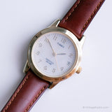 Vintage élégant Timex Indiglo montre | Ton d'or Timex Date montre