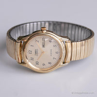 Vintage elegante Timex Indiglo reloj | Tono dorado Timex Fecha reloj