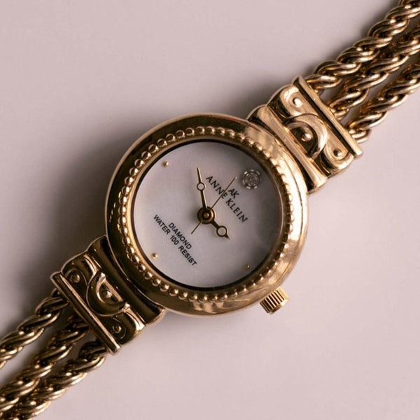 كلاسيكي Anne Klein مراقبة الماس للنساء | ساعة ذهبية أنيقة