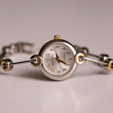 Tono plateado redondo vintage Anne Klein reloj para mujeres con pulsera delgada