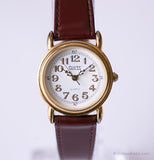 Tón de oro clásico vintage Guess reloj Para mujeres con correa de Borgoña