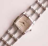 Informal simple Anne Klein reloj para mujeres de acero de tono plateado