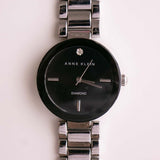 اللون الأسود والفضي Anne Klein ساعة الماس للنساء