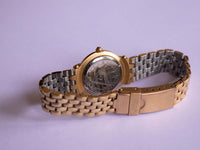Tone d'or de luxe Guess montre Pour les femmes avec un bracelet à ton or