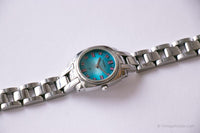 Blaues Dial Fossil Uhr mit rosa Stundenmarkierungen | Jahrgang Fossil Uhr für Sie