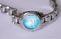 Blaues Dial Fossil Uhr mit rosa Stundenmarkierungen | Jahrgang Fossil Uhr für Sie