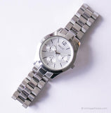 Vintage Silver-tone Relic by Fossil Day Date Quartz Watch for Women