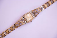 Guess Quadratisches Dial Uhr Für Frauen mit einzigartigem silbertonem Armband