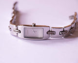 DKNY Piccolo orologio tono d'argento per donne | Orologi da donna con marchio