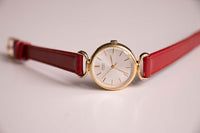 Tono d'oro degli anni '90 Seiko 1421-0060a orologio per donne sulla cinturino rosso