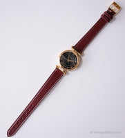 Vintage Black-Dial Gold-tone Fossil Ladies Watch with Roman Numerals