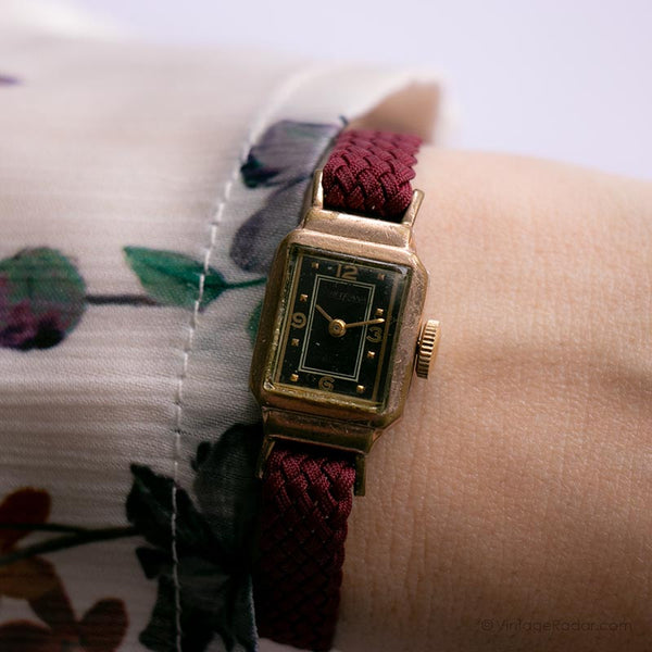 Orologio placcato in oro antico degli anni '50 con quadrante nero - orologio tedesco vintage