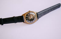 Mécanique du cadran noir trada montre | Vintage à l'épreuve des chocs des années 1970 montre