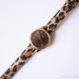 Cadran brun vintage Timex montre | Montre à bracelet à imprimé léopard