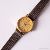Tiny-bracelet vintage par Timex Q | Mesdames Textured Brown Strap montre