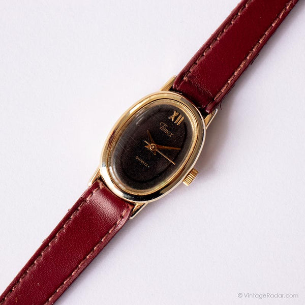 Tiny oval ovalo vintage da Timex | Dial quadrante nero orologio da tono d'oro per lei