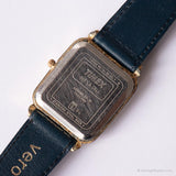 خمر مستطيلة Timex مشاهدة | ساعة تاريخ النغمة الذهبية مع حزام أزرق